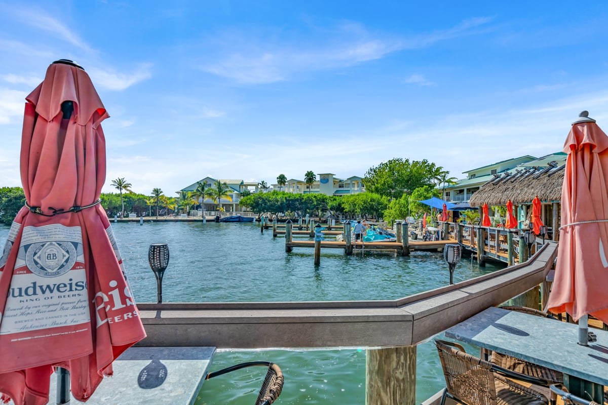 Dockside view at the Dove Creek marina, boats moored along the pier