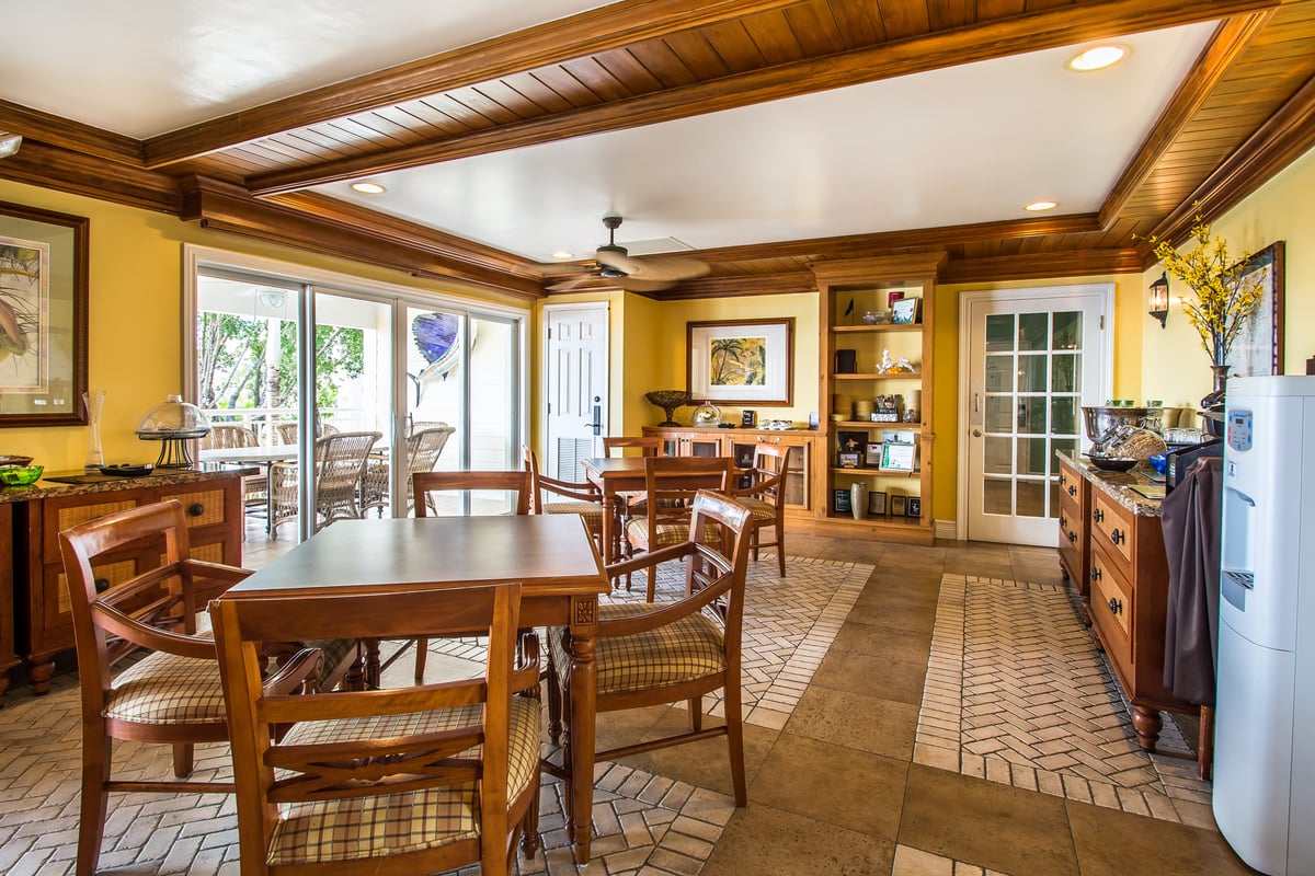 Breakfast on the Dove Creek Resort & Marina rooftop deck — pastries, fruit and coffee on a table above the creek and the marina